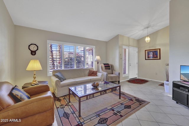 tiled living room featuring lofted ceiling