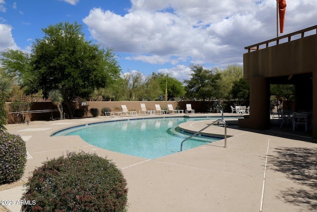 view of pool featuring a patio area