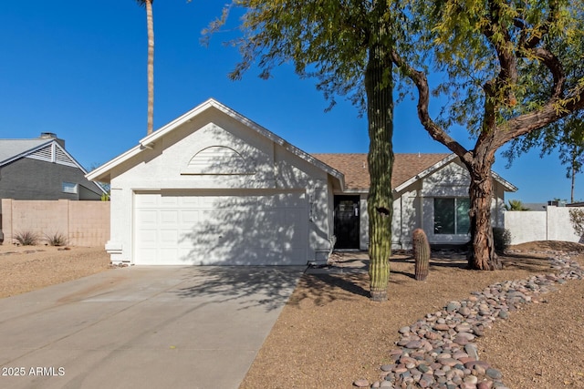 ranch-style house featuring a garage