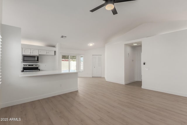 unfurnished living room with ceiling fan, lofted ceiling, and light hardwood / wood-style floors