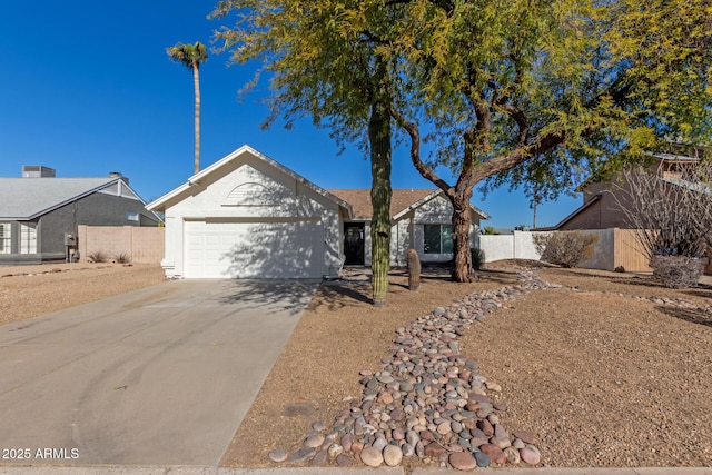 ranch-style home featuring a garage