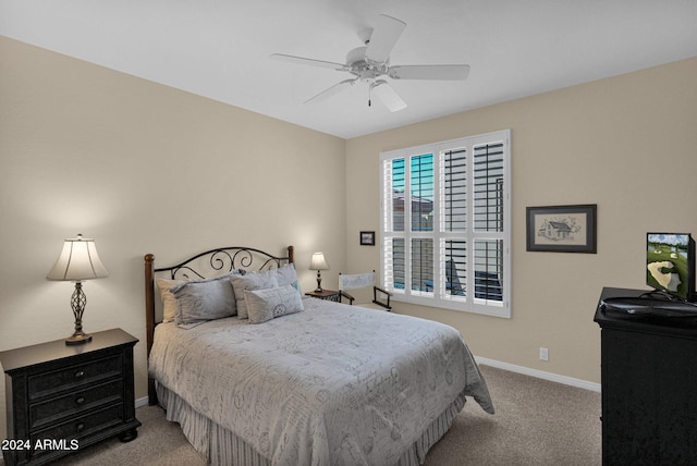 bedroom with light colored carpet and ceiling fan