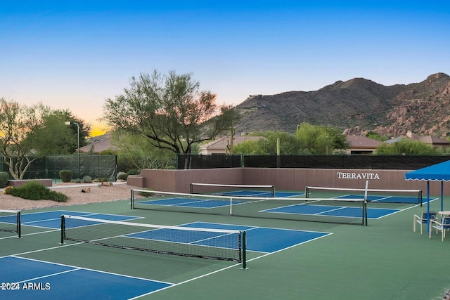 view of sport court with a mountain view