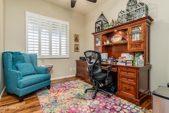 office space featuring light hardwood / wood-style flooring and ceiling fan