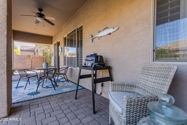 view of patio with ceiling fan