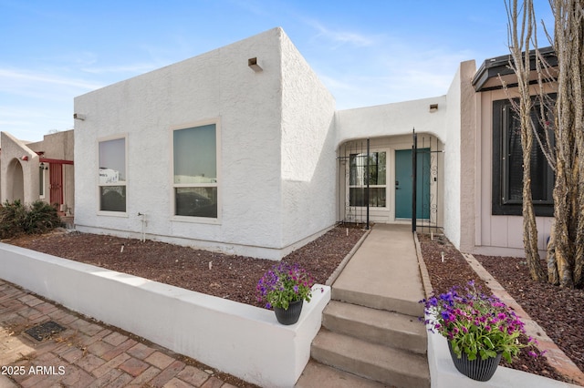 exterior space with stucco siding