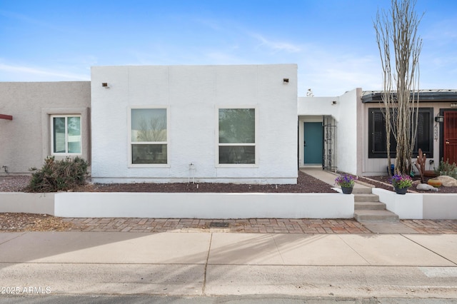 view of front of house with stucco siding