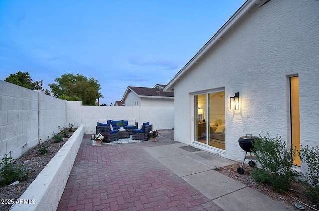 view of patio featuring a fenced backyard and an outdoor hangout area