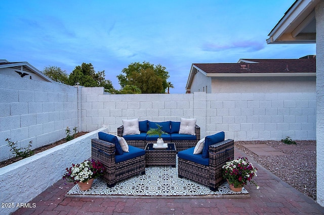 view of patio with a fenced backyard and an outdoor living space