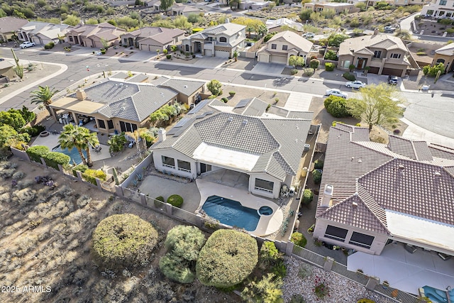 birds eye view of property with a residential view