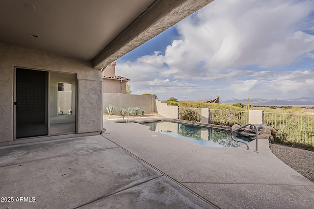 view of swimming pool featuring a patio, a fenced backyard, and a fenced in pool