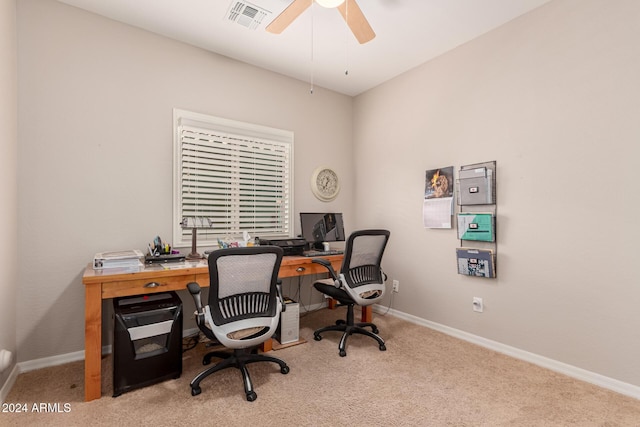 office area with ceiling fan and light carpet