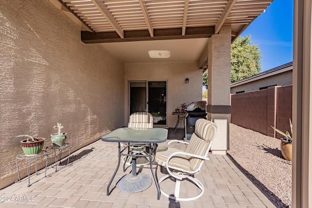 view of patio / terrace featuring a pergola