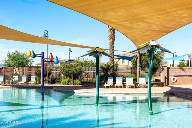 view of pool featuring a patio