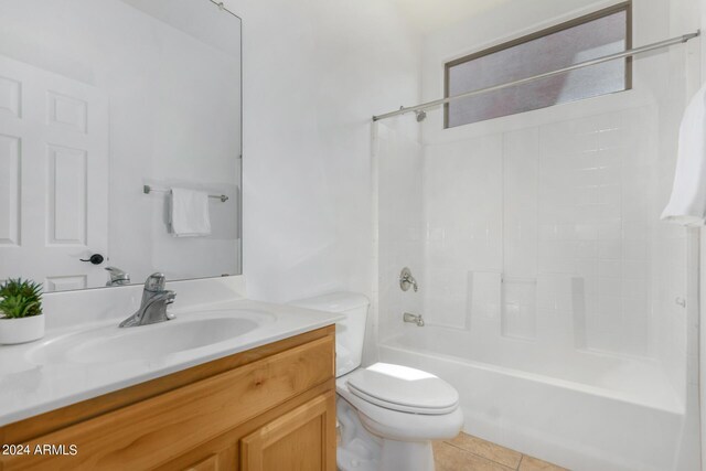 full bathroom with vanity, toilet, tile patterned floors, and tub / shower combination