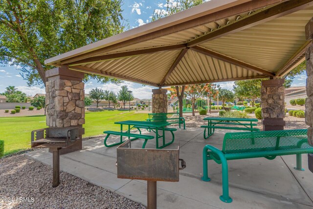 view of patio / terrace with a gazebo and a playground