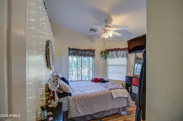 bedroom featuring hardwood / wood-style floors and ceiling fan