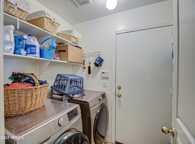 laundry area featuring independent washer and dryer