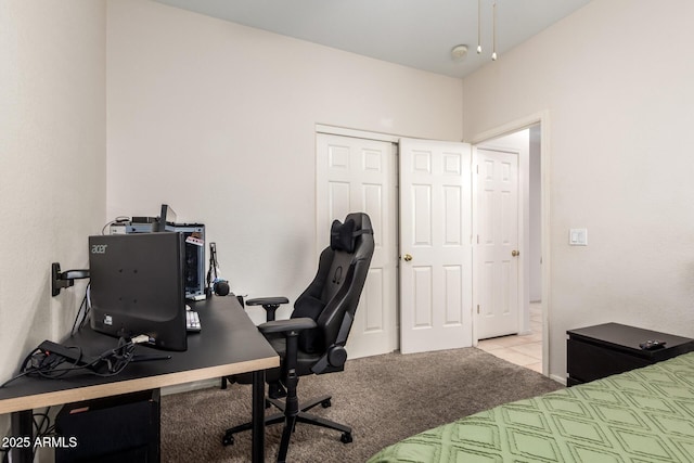 carpeted office space with tile patterned floors