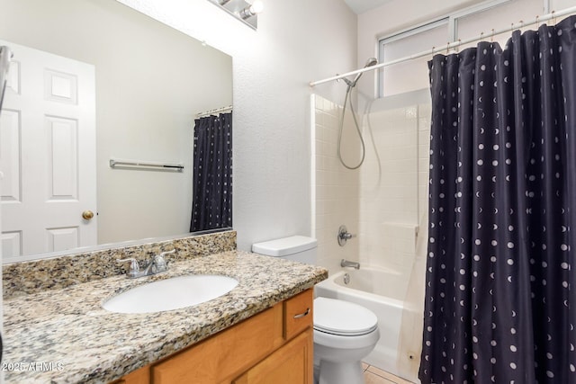 bathroom with shower / bath combo, tile patterned flooring, vanity, and toilet