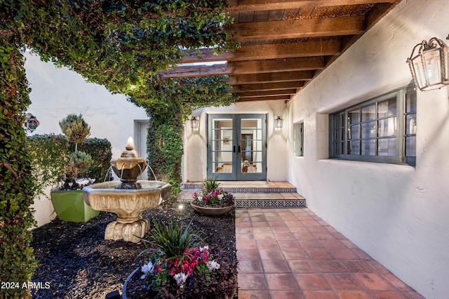 doorway to property with french doors