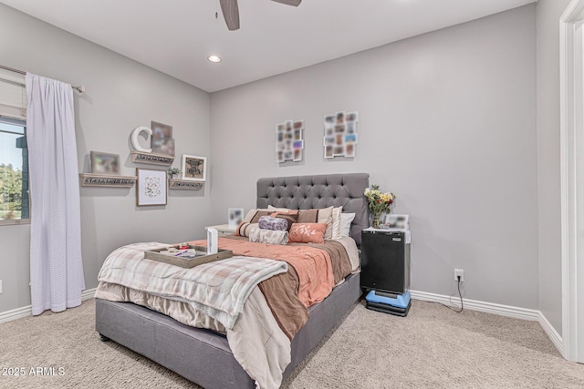 bedroom with ceiling fan and carpet floors