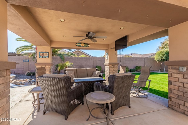 view of patio featuring outdoor lounge area and ceiling fan