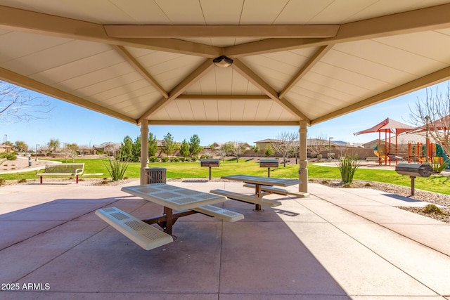 view of patio with a gazebo and a playground