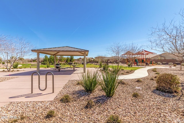 view of community with a gazebo and a playground