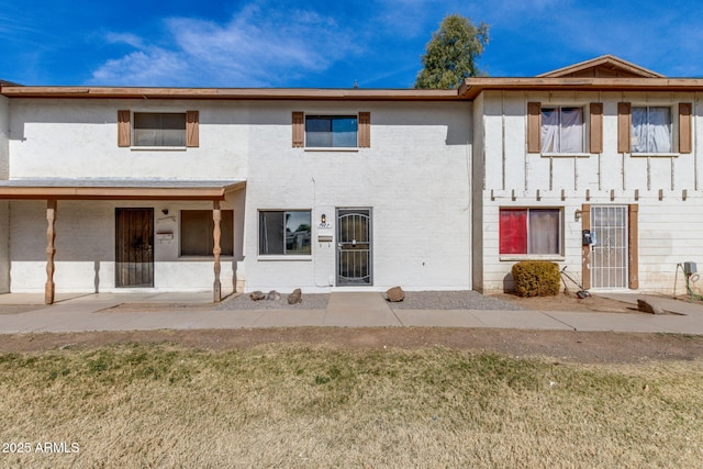 view of property with stucco siding