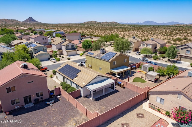 drone / aerial view featuring a mountain view