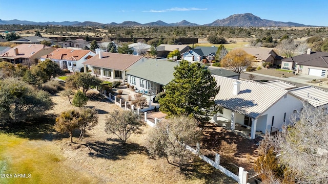 drone / aerial view featuring a mountain view