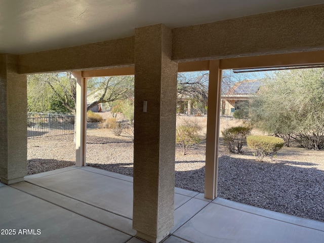 doorway with concrete flooring