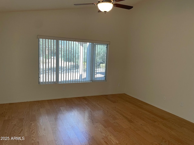 unfurnished room with ceiling fan and light wood-type flooring