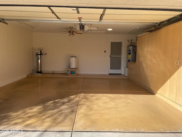 garage featuring electric water heater, ceiling fan, and a garage door opener