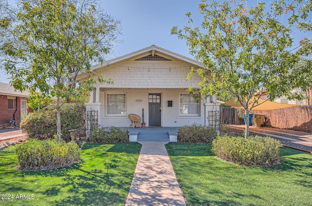 bungalow-style home with covered porch