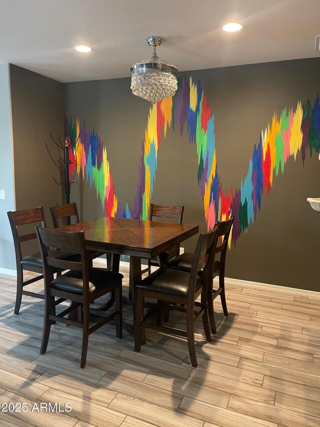 3211 W Pollack St, Phoenix, AZ 85041 - dining space featuring light wood-type flooring, recessed lighting, and baseboards