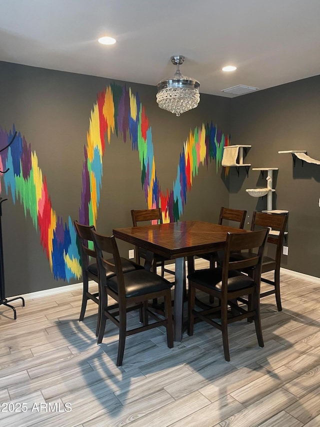 3211 W Pollack St, Phoenix, AZ 85041 - dining space with light wood finished floors, baseboards, recessed lighting, and a chandelier