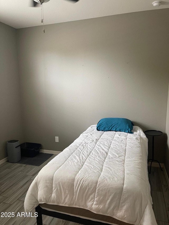 3211 W Pollack St, Phoenix, AZ 85041 - bedroom featuring baseboards and wood finished floors