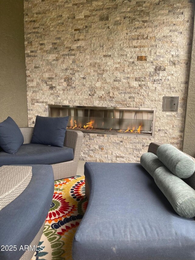 3211 W Pollack St, Phoenix, AZ 85041 - view of patio / terrace featuring a glass covered fireplace