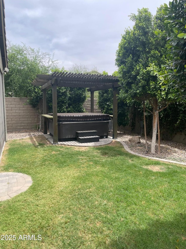 3211 W Pollack St, Phoenix, AZ 85041 - view of yard with a hot tub and a pergola