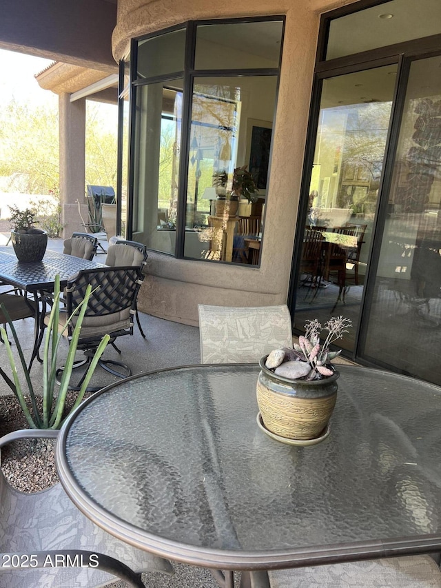 view of patio featuring outdoor dining space