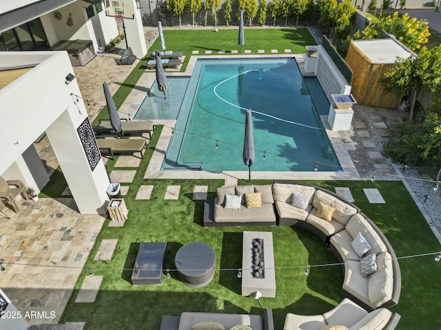 view of swimming pool featuring an outdoor hangout area, basketball court, and a lawn