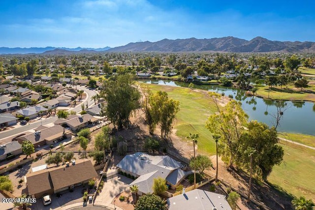 birds eye view of property with a residential view and a water and mountain view