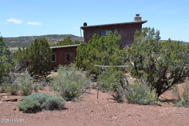 3733 Del Contento Rd, Snowflake, AZ 85937 - view of property exterior featuring a chimney