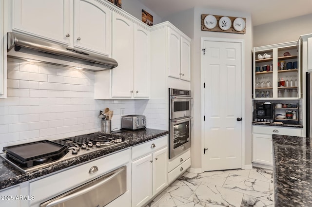 8115 W San Miguel Ave, Glendale, AZ 85303 - kitchen featuring marble finish floor, white cabinetry, under cabinet range hood, a warming drawer, and stainless steel appliances
