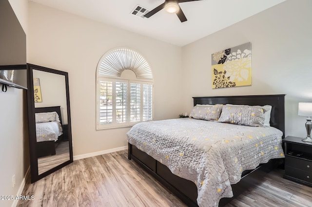8115 W San Miguel Ave, Glendale, AZ 85303 - bedroom with baseboards, ceiling fan, wood finished floors, and visible vents