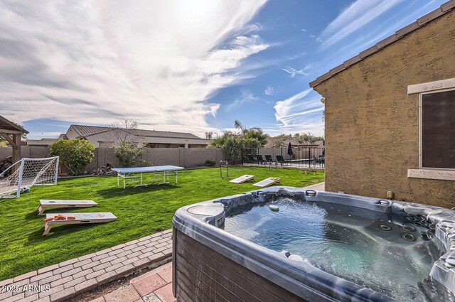 8115 W San Miguel Ave, Glendale, AZ 85303 - view of yard with a fenced backyard, a trampoline, and a hot tub
