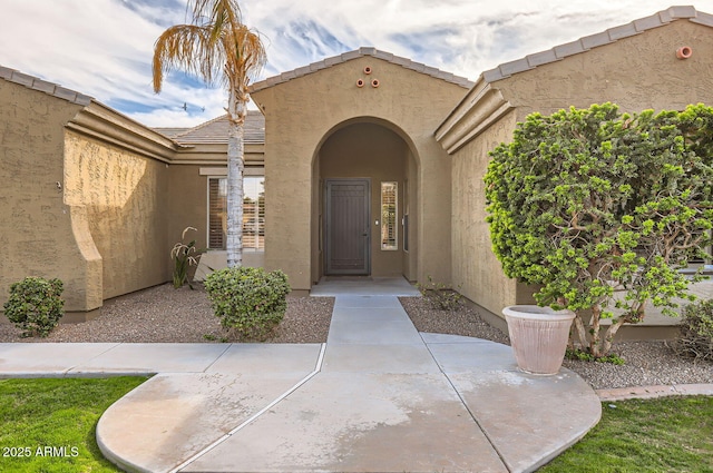 8115 W San Miguel Ave, Glendale, AZ 85303 - property entrance with stucco siding and a tiled roof
