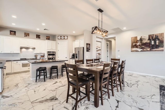 8115 W San Miguel Ave, Glendale, AZ 85303 - dining area with baseboards, visible vents, recessed lighting, and marble finish floor